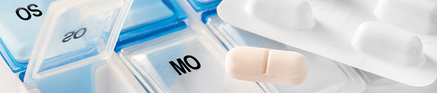 Bild zeigt eine Pillen-Wochendose als Beispiel für die Anwendung von Druckfarben für medizinische Produkte.